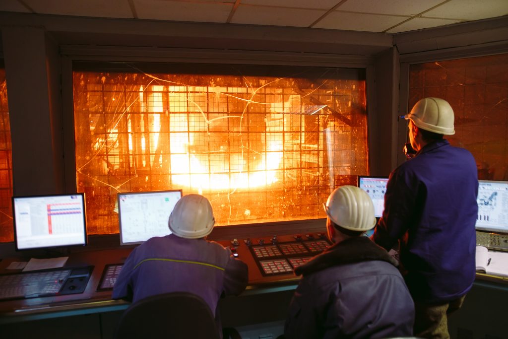 Chinese smelter image of men working - az-china